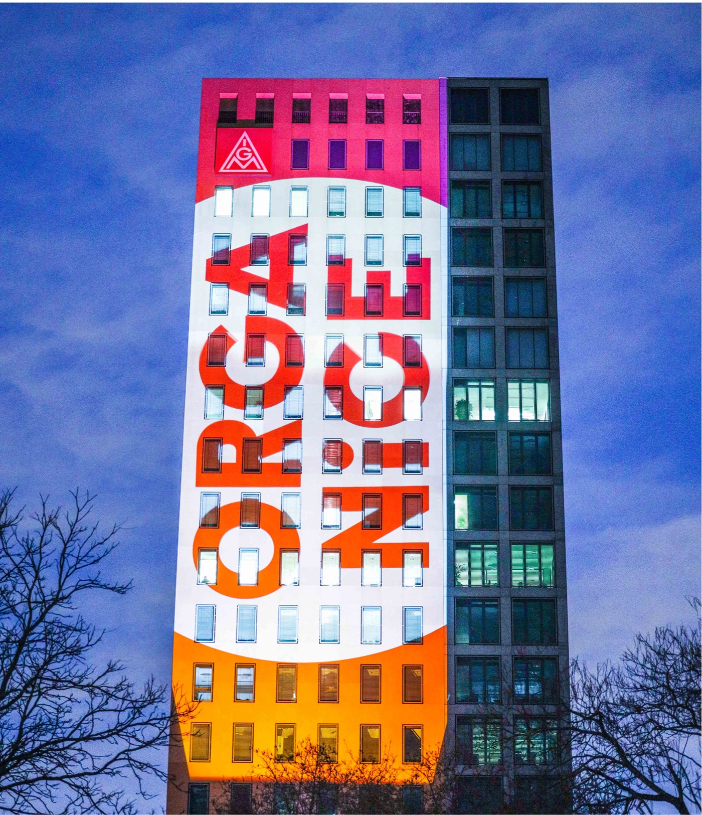 Organice lettering projected onto a tower