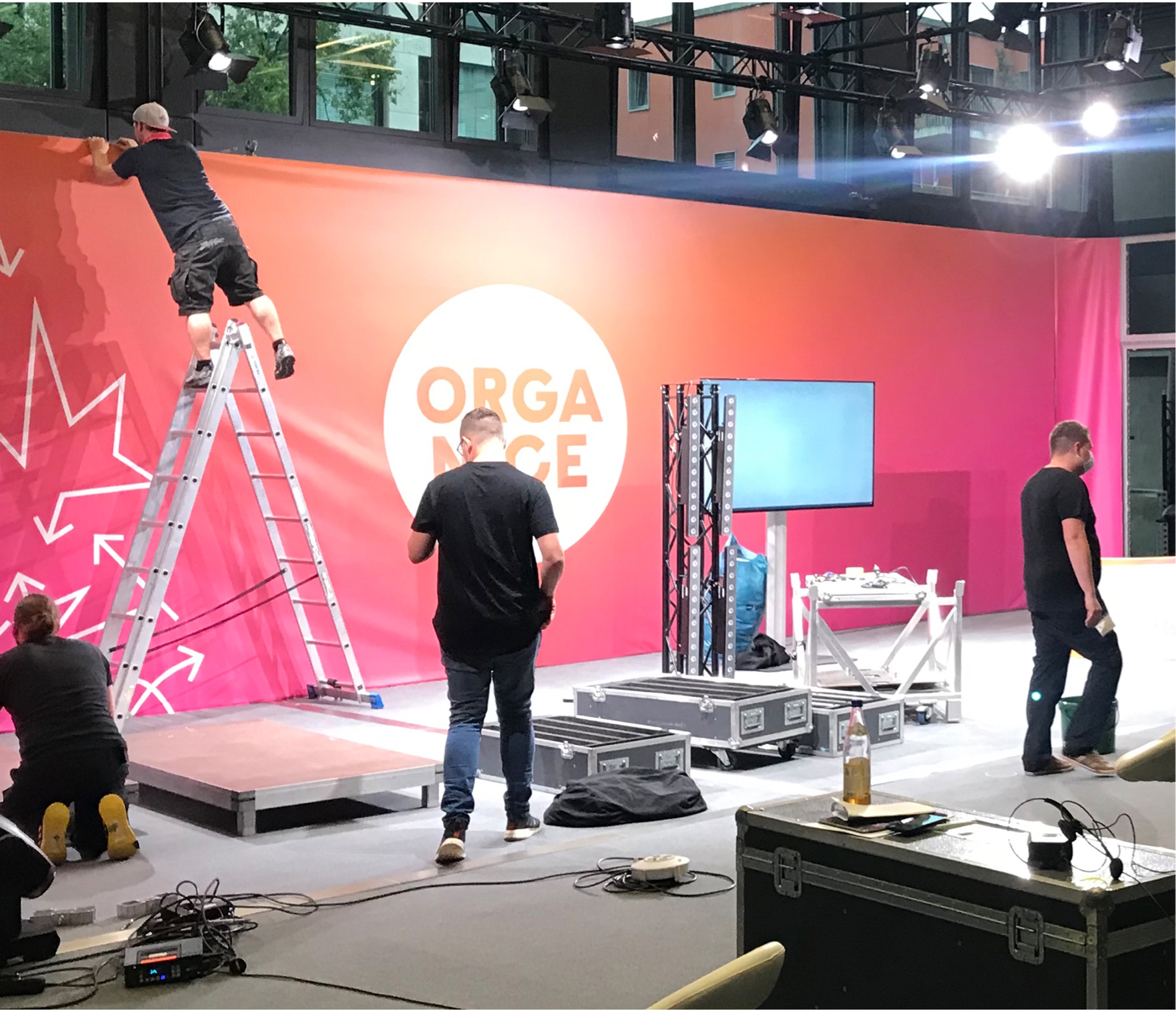 Organice stage set being built for a campaign event